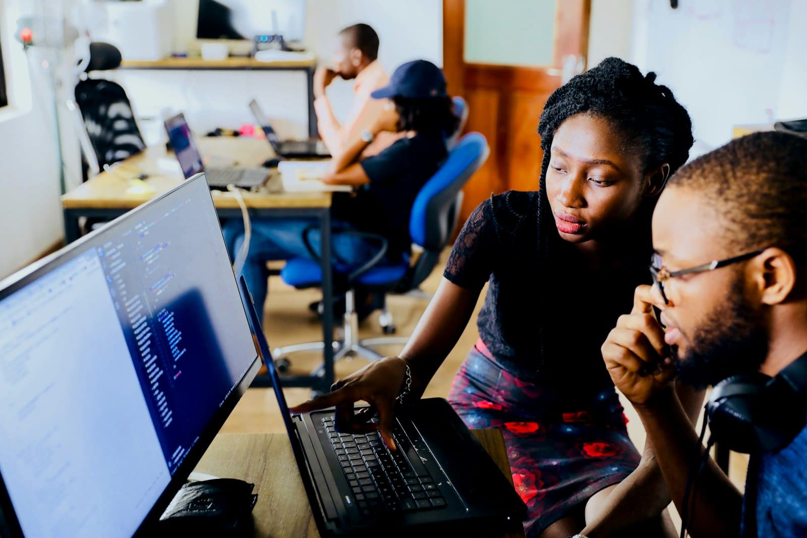 Team members working together in the studio