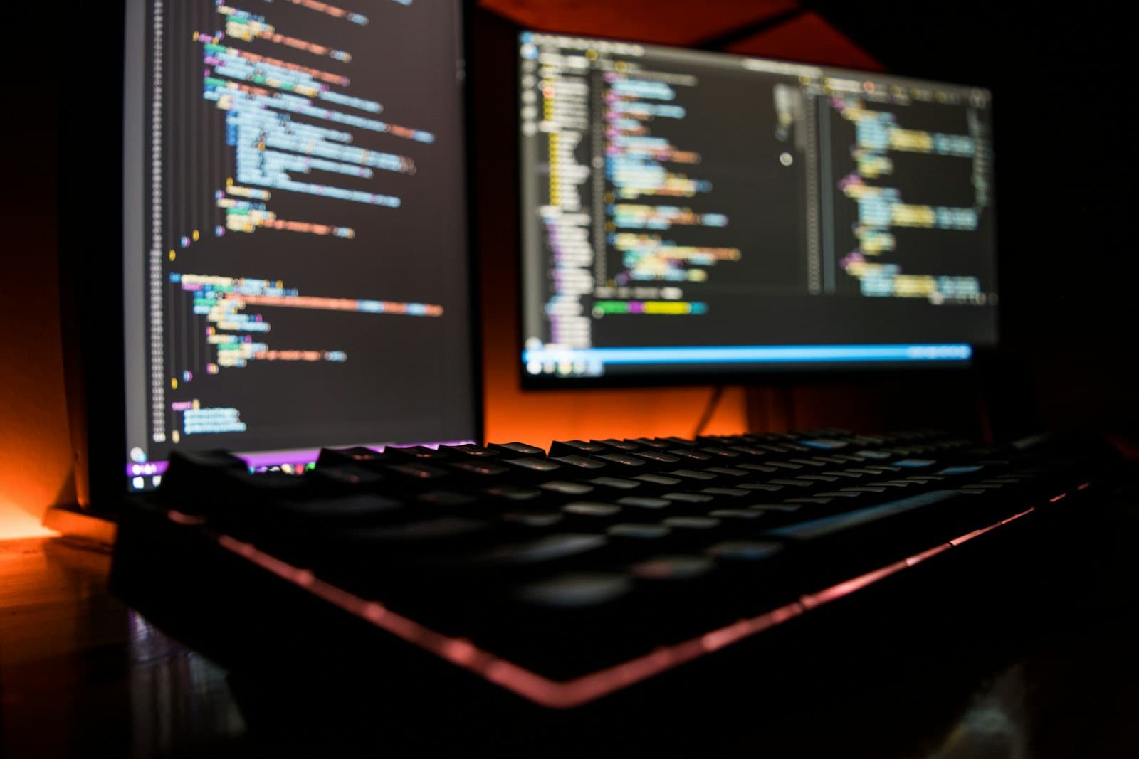 SEO analytics dashboards displayed on dual monitors